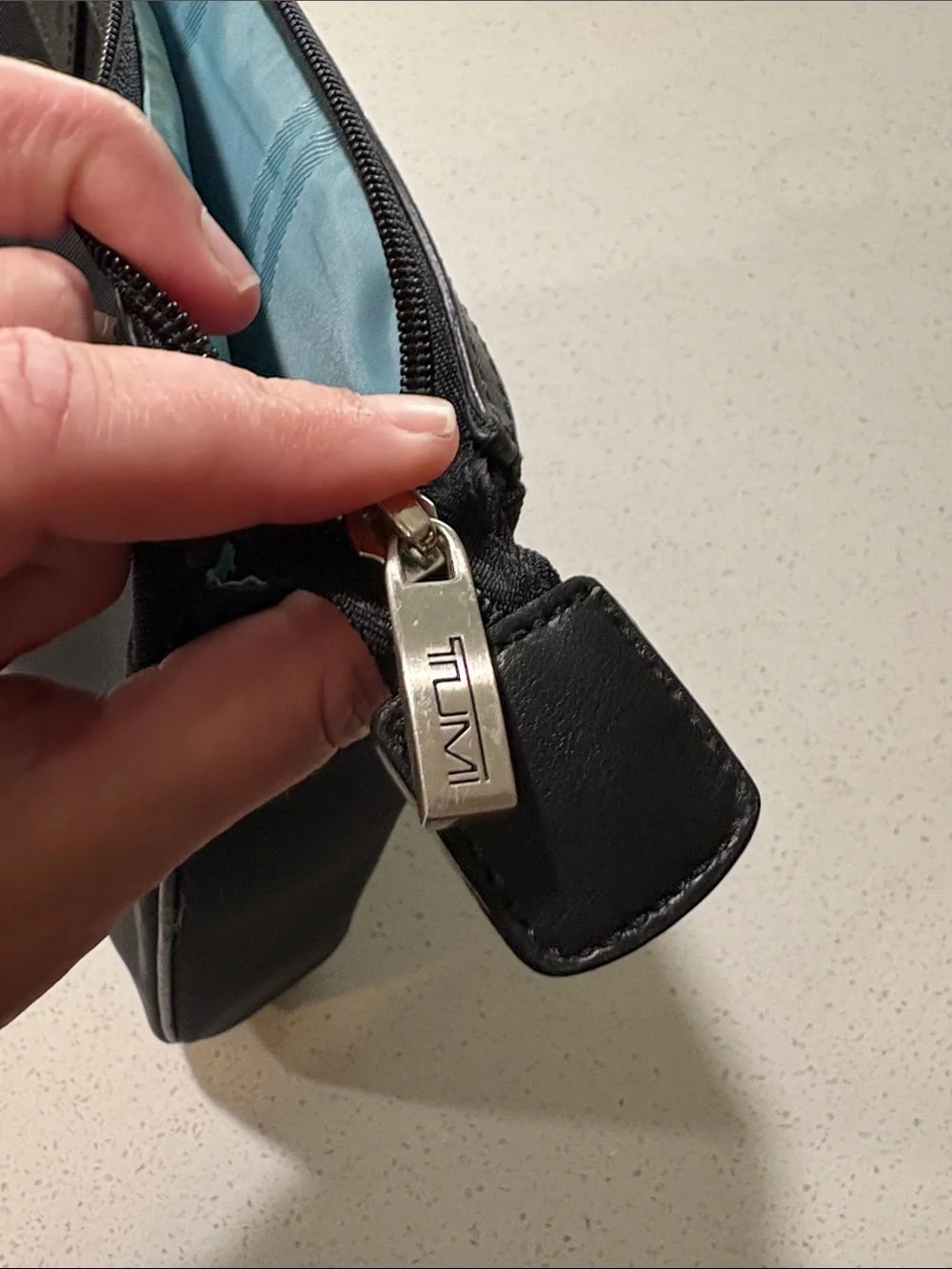 Tumi sleek black